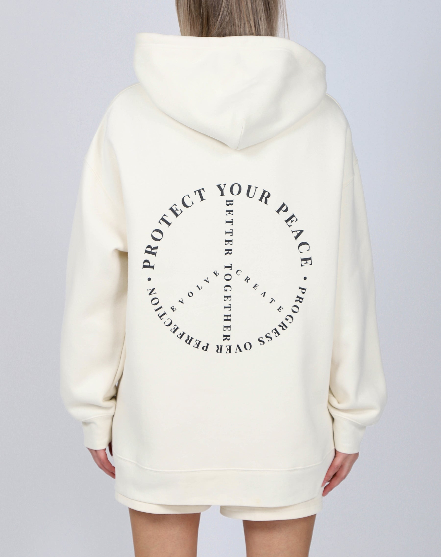 The "PROTECT YOUR PEACE" Big Sister Hoodie | Almond Milk & Black